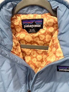 Patagonia Light Blue Quilted Jacket with Peach Floral Lining